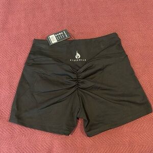 RYDERWEAR - size Large, Black staples scrunch booty shorts.